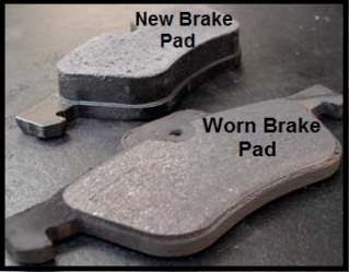 Worn brake pads vs. new brake pads.